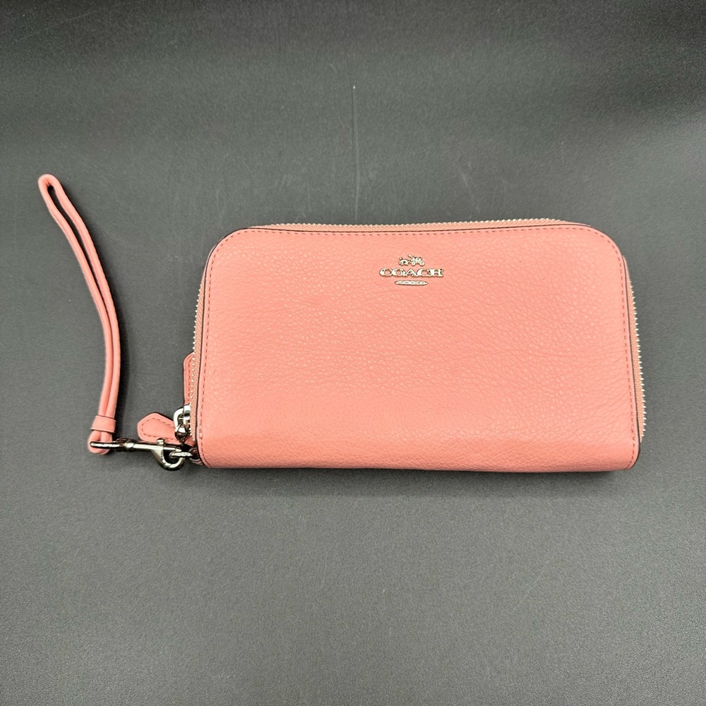 Coach pink peddled leather clutch wristlet